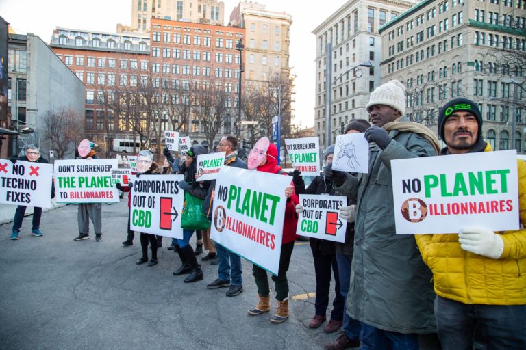 Protest action against the involvement and lobbying of the private sector at COP15. Image by ETC Group.