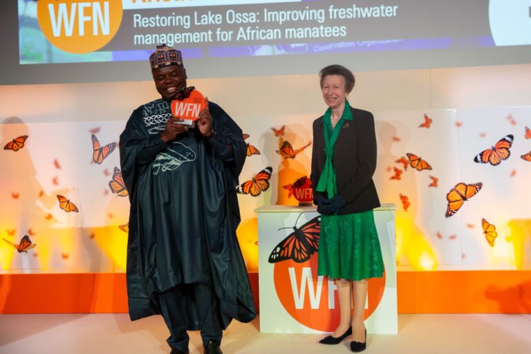 Aristide Kamla receives the Whitley Award from the charity patron, Ann, Princess Royal. (Credit: Rubin Besureis).