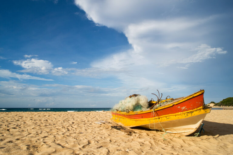 An artisanal fishing boat on a Mozambique beach.