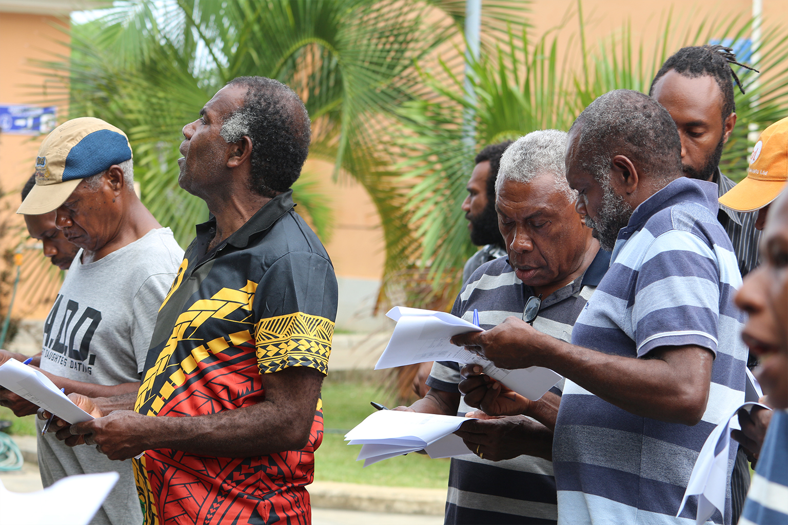 Chiefs from Vanuatu using the traditional knowledge data collection form to record traditional knowledge changes in the field. Image by VanKIRAP Project/SPREP.