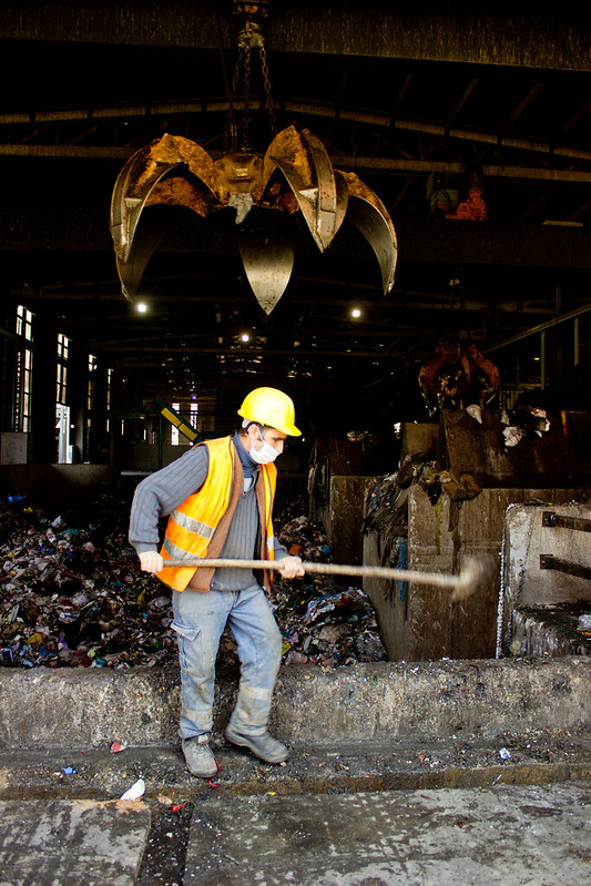 A worker separates waste at the Mamak recycling facility near Ankara, Turkey.