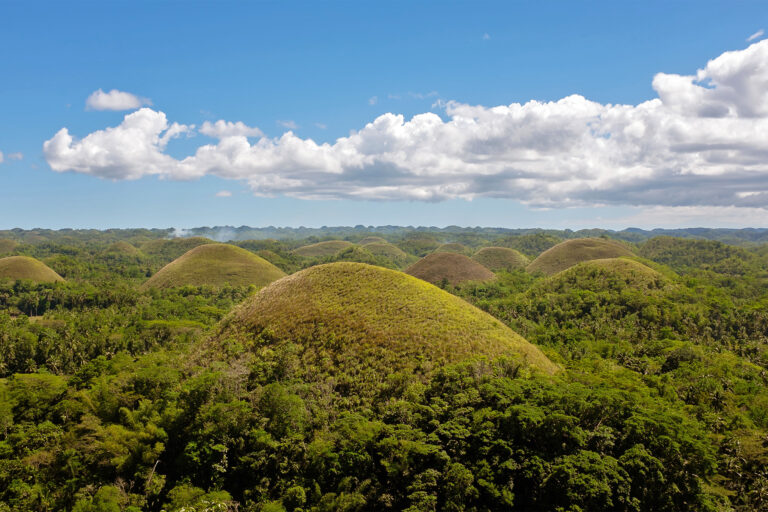 The Chocolate Hills of Bohol Island in the central Philippines are a sprawling geological wonder, shaped by nature millions of years ago.