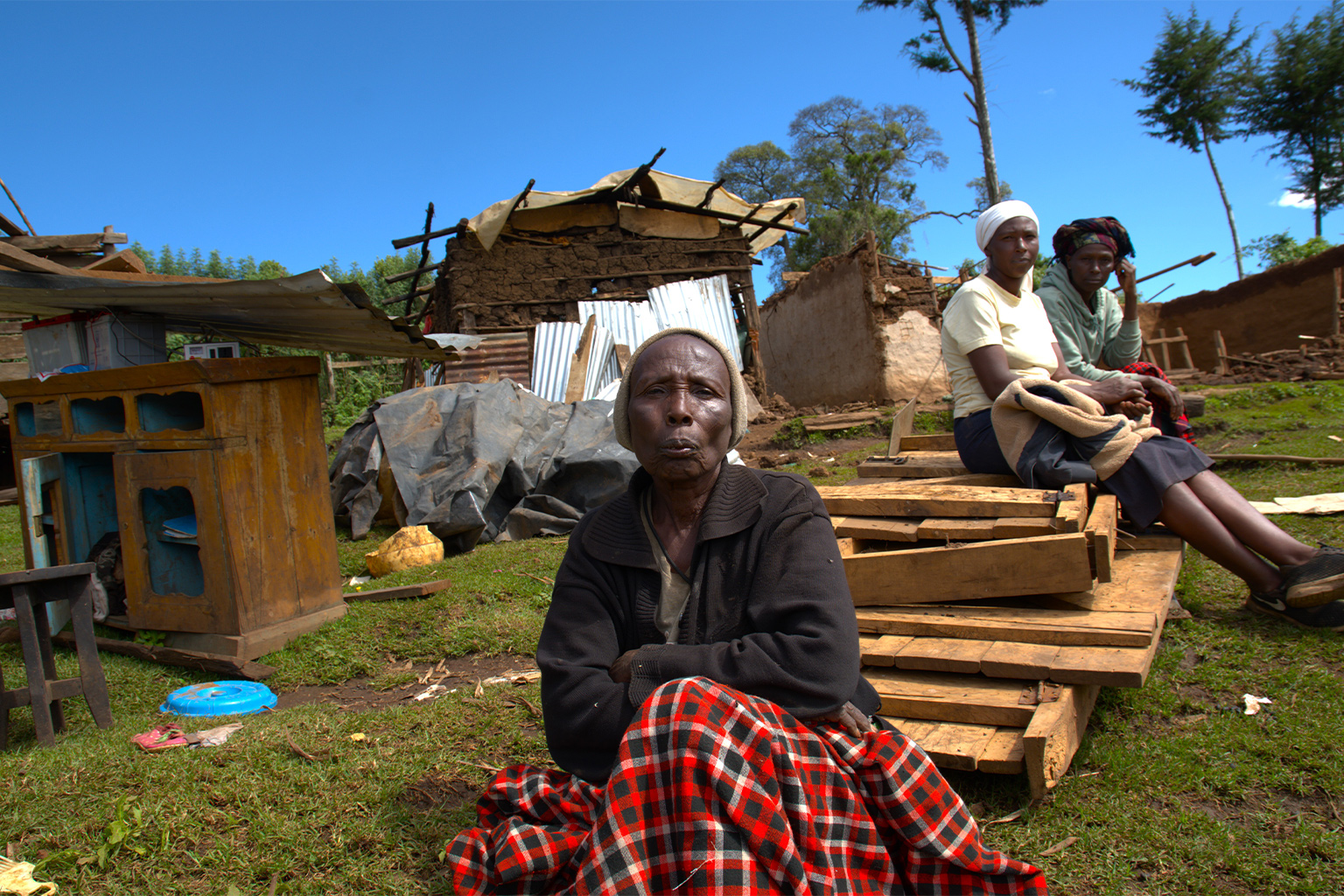 Esther Norparua sits in her compound near her demolished houses in Sasimwani