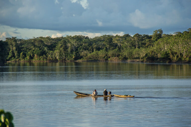 An Indigenous group in a boat in the Ucayali River.