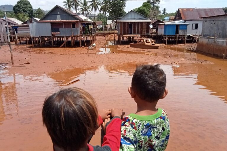 The sea and the coastal residential land are affected by the waste of upstream nickel mining operations.