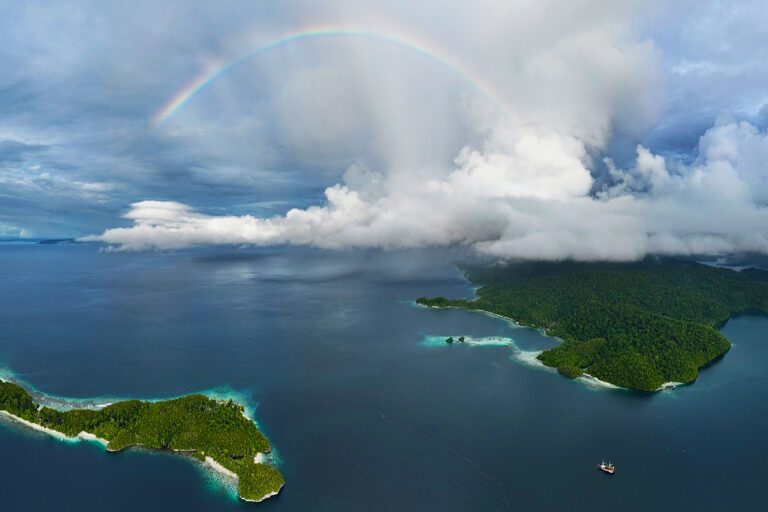 Rainbow over Batanta and Dayang islands in Indonesia.