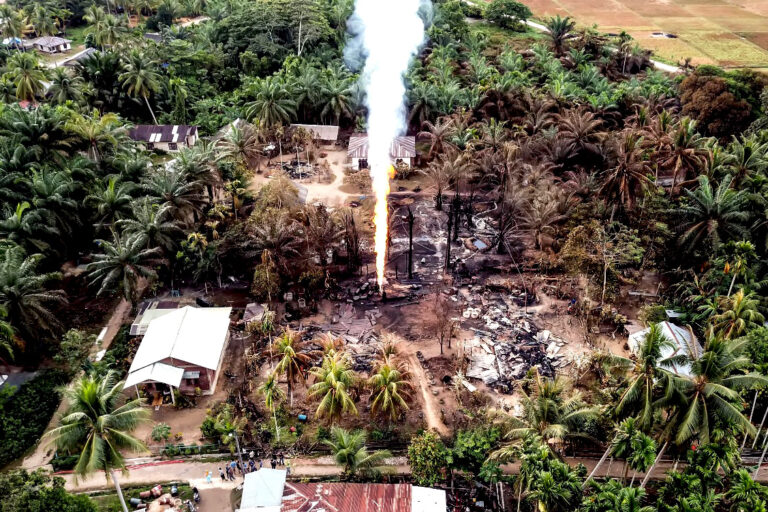 Aerial photo of the environmental conditions caused by an illegal crude oil well exploding in Pasir Putih village, East Aceh Regency, on 26 Apr., 2018.